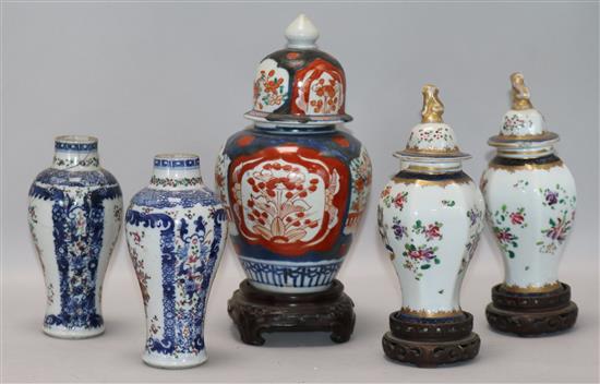 A pair of Chinese famille rose vases, a pair Samson vases and cover, and an Imari vase and cover smallest 15cm, tallest 22cm